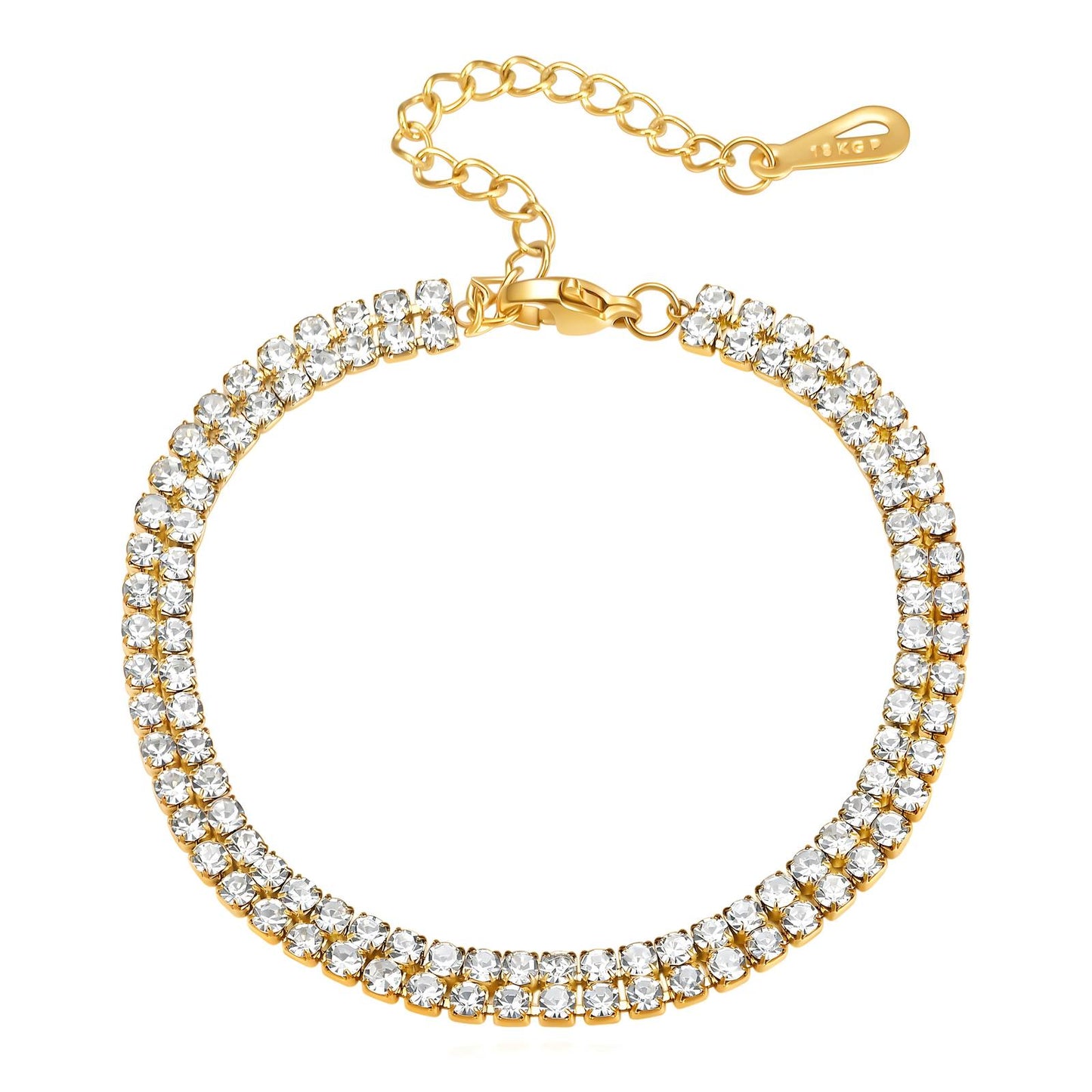 Gold bracelet with clear crystals on a white background
