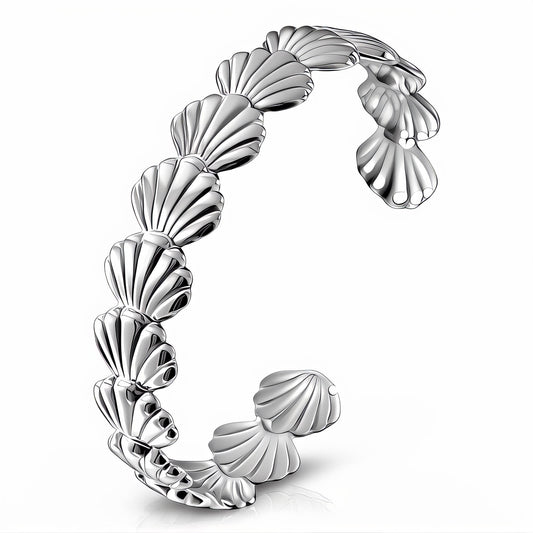 Silver shell-shaped ring on a white background