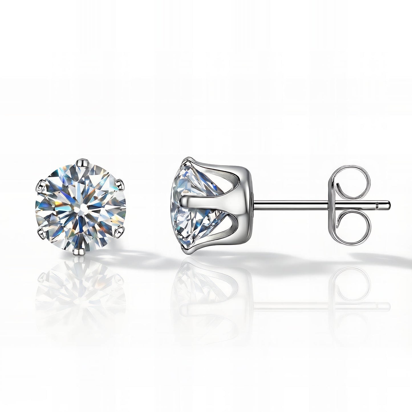 Silver stud earrings with clear gemstones on a white background