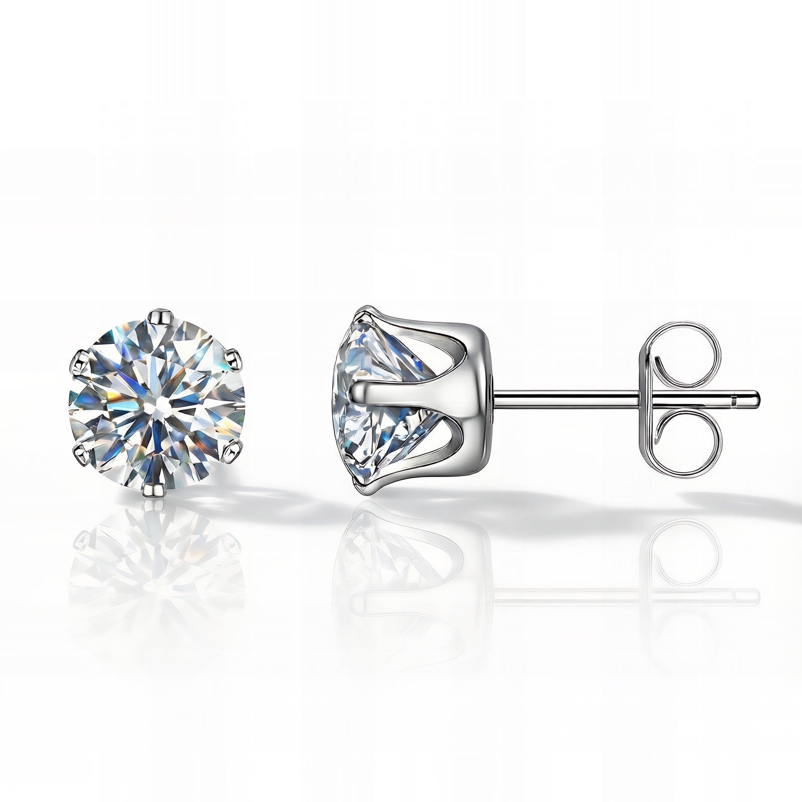 Silver stud earrings with clear gemstones on a white background